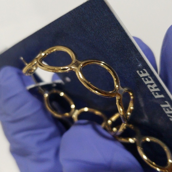 Elegant Gold tone Twisted Design Hoop Earrings - Women's Fashion Jewelry - Picture 7 of 7